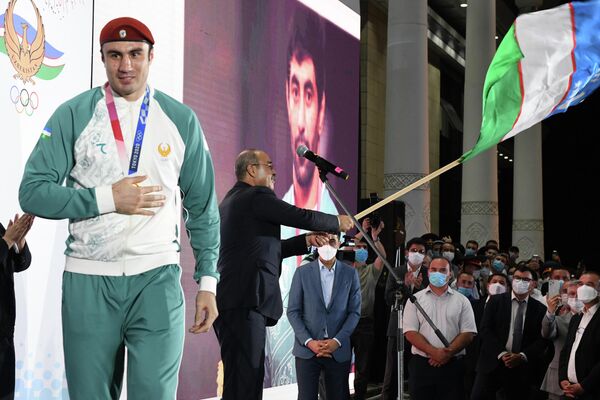Встреча олимпийской сборной Узбекистана в Ташкенте после Игр в Токио. - Sputnik Узбекистан