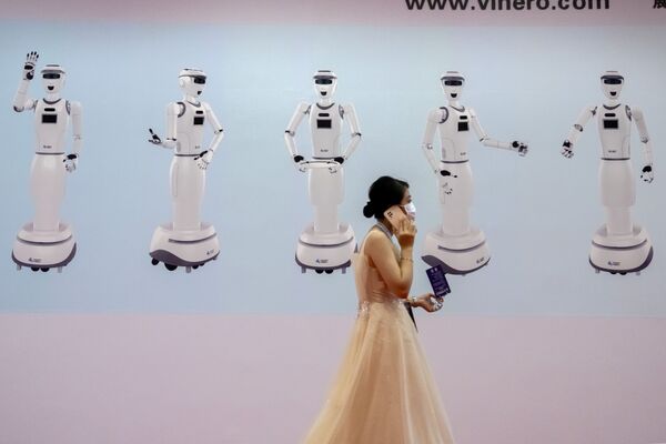 Выставка проходит каждый год и демонстрирует последние достижения Китая в сфере робототехники. - Sputnik Узбекистан