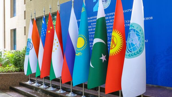 Флаги участников заседания Совета министров иностранных дел государств-членов ШОС - Sputnik Узбекистан