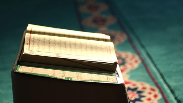 Коран, иллюстративное фото - Sputnik Ўзбекистон