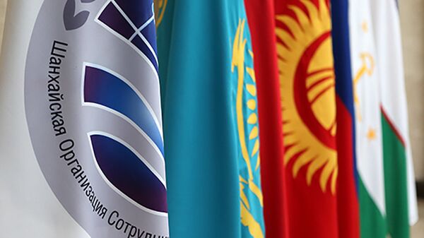 Флаги и эмблема ШОС - Sputnik Узбекистан