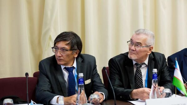 
Uzbekskie epidemiologi Dilmurod Sabirovich Mirzabayev i Marufjon Madaminov - Sputnik O‘zbekiston