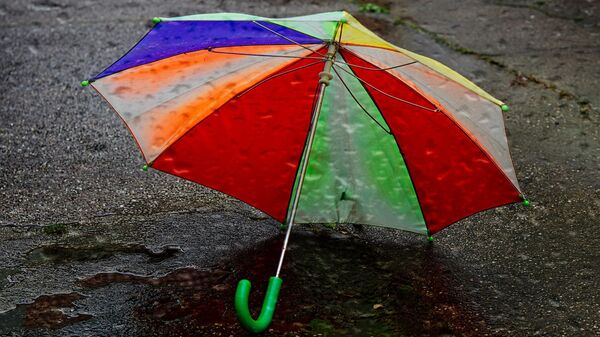 Зонт, иллюстративное фото - Sputnik Ўзбекистон