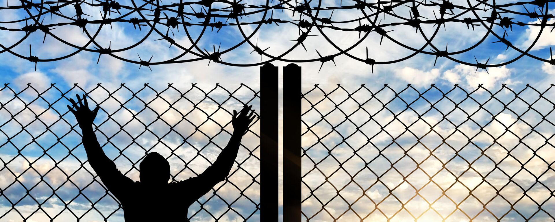 Человек за колючей проволокой - Sputnik Ўзбекистон, 1920, 04.09.2025