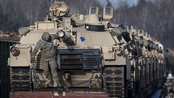 Amerikanskie tanki Abrams u jeleznodorojnoy stansii Gayjunay bliz Vilnyusa, Litva. Arxivnoe foto - Sputnik O‘zbekiston