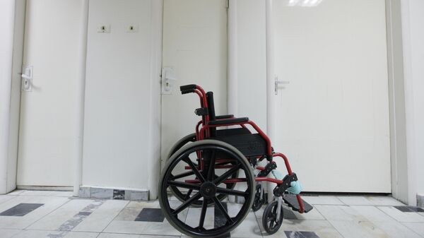 Инвалидная коляска, архивное фото - Sputnik Ўзбекистон