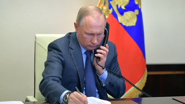Президент РФ В. Путин провел встречу с губернатором Калининградской области А. Алихановым - Sputnik Ўзбекистон