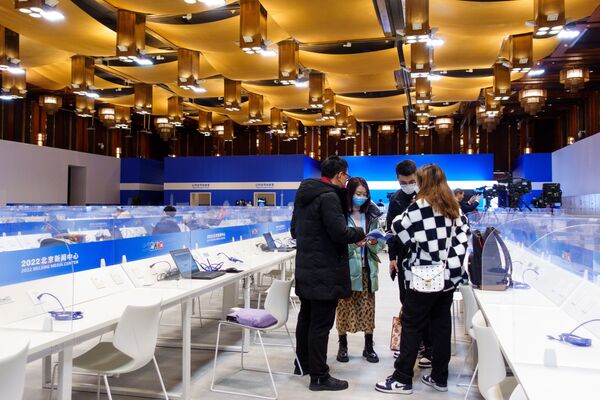 Пресс-центр зимних Олимпийских игр-2022 в Пекине. - Sputnik Узбекистан