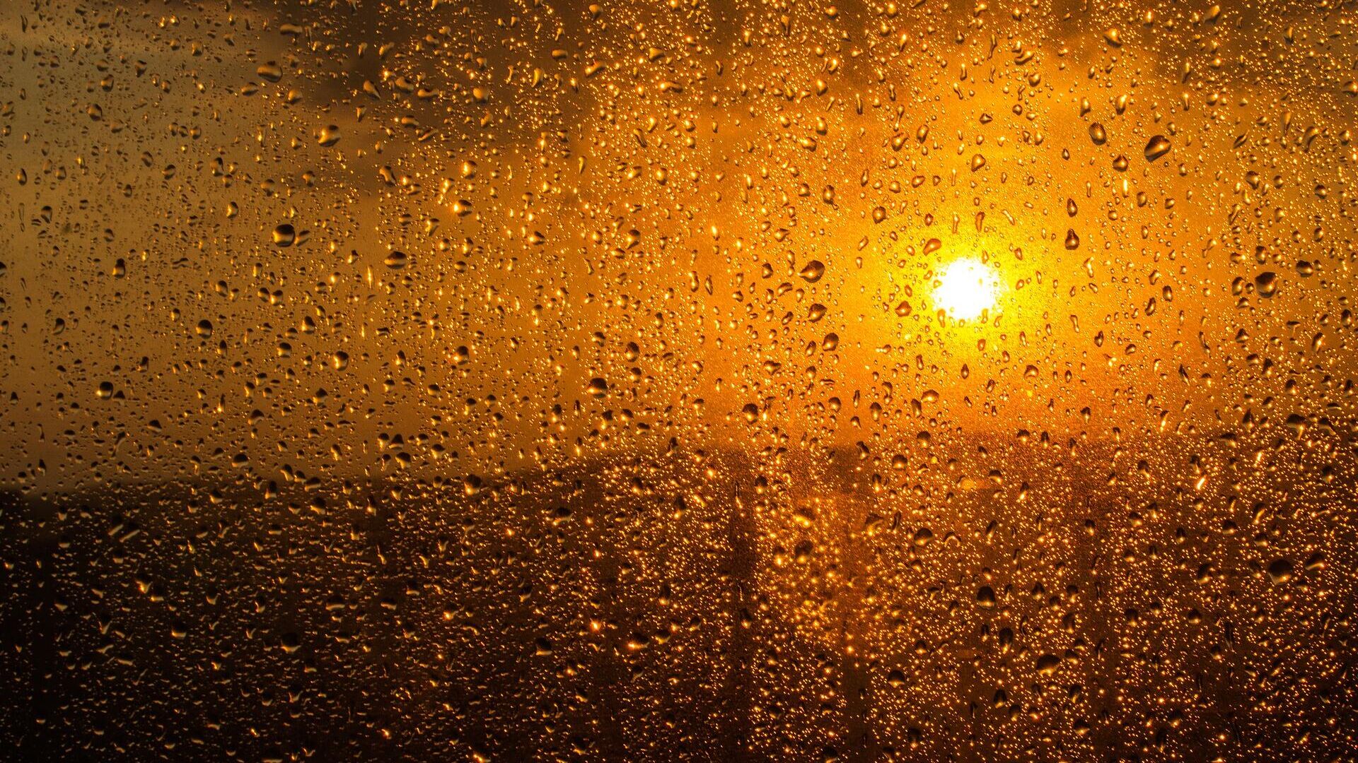 дождливое-окно-заход-солнца - Sputnik Узбекистан, 1920, 09.03.2023