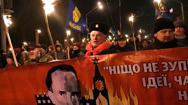 Шествие в честь 111-й годовщины рождения Степана Бандеры в Киеве, Украина - Sputnik Узбекистан
