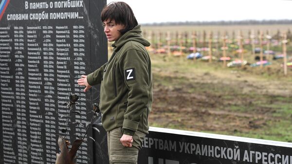 Мероприятие в ЛНР в День памяти жертв украинской агрессии, архивное фото - Sputnik Узбекистан
