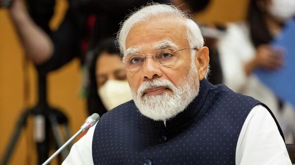 Премьер-министр Индии Нарендра Моди принимает участие в саммите лидеров четырех стран в Токио 24 мая 2022 года - Sputnik Узбекистан