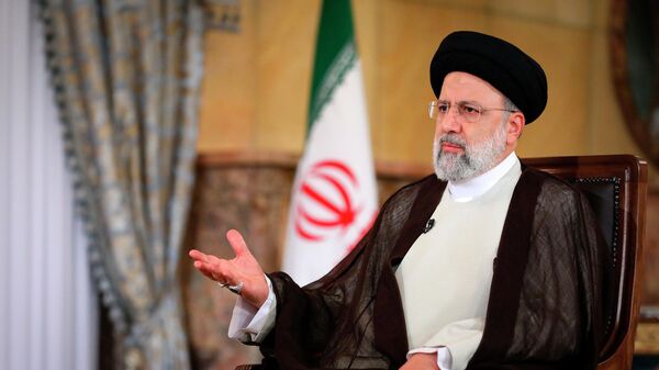 Президент Эбрахим Раиси выступает в интервью телевидению в президентском офисе в Тегеране, Иран, 28 сентября 2022 г. - Sputnik Ўзбекистон