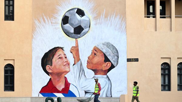 Graffiti v chest ChM-2022 po futbolu v Katare  - Sputnik O‘zbekiston