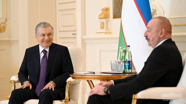 Шавкат Мирзиёев на встрече в Баку с Президентом Азербайджанской Республики Ильхамом Алиевым. Архивное фото - Sputnik Ўзбекистон