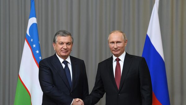 Prezident Respubliki Uzbekistan Shavkat Mirziyoyev i Prezident Rossiyskoy Federatsii Vladimir Putin - Sputnik Oʻzbekiston