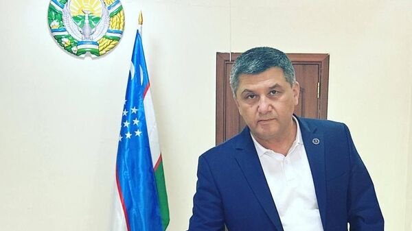 Заместитель министра молодежной политики и спорта Шахрилло Махмудов и наши спортсмены проголосовали за референдум - Sputnik Узбекистан