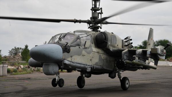 Работа вертолета Ка-52 группировки Юг на Артемовском направлении. - Sputnik Узбекистан
