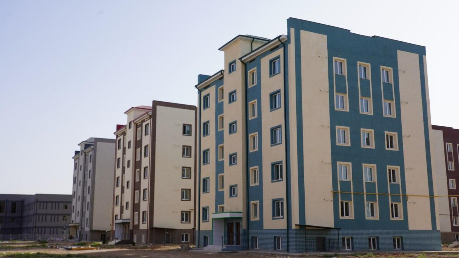 Многоквартирные дома в Косонском районе. - Sputnik Узбекистан, 1920, 05.07.2023