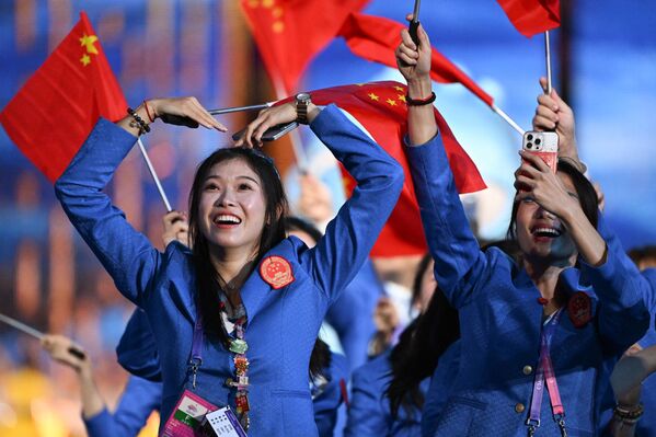 Парад команд: участники команды Китая. - Sputnik Узбекистан