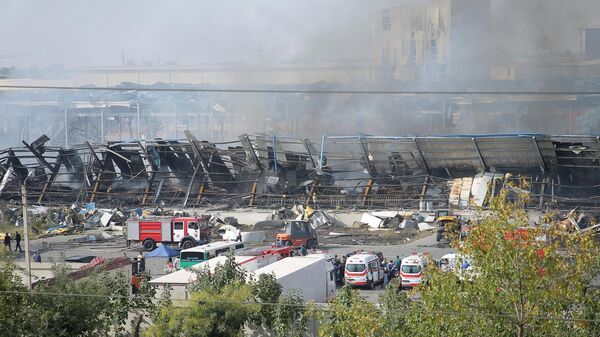 Спасатели работают на месте взрыва в Ташкенте 28 сентября 2023 года. - Sputnik Узбекистан