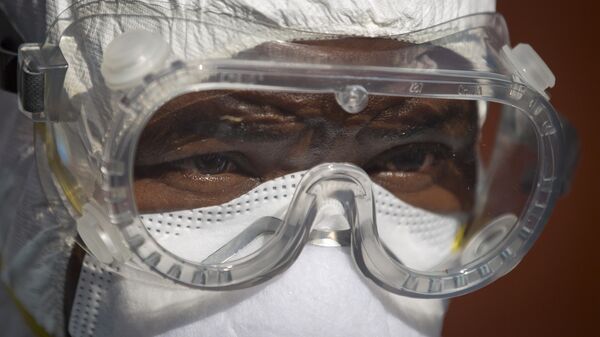 Медицинский работник в Кении. Архивное фото - Sputnik Ўзбекистон