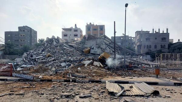 Обломки зданий, пострадавших в результате ракетных ударов ВС Израиля по Газе. Архивное фото - Sputnik Узбекистан