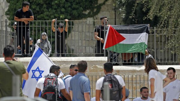Флаги Палестины и Израиля. Архивное фото - Sputnik Узбекистан