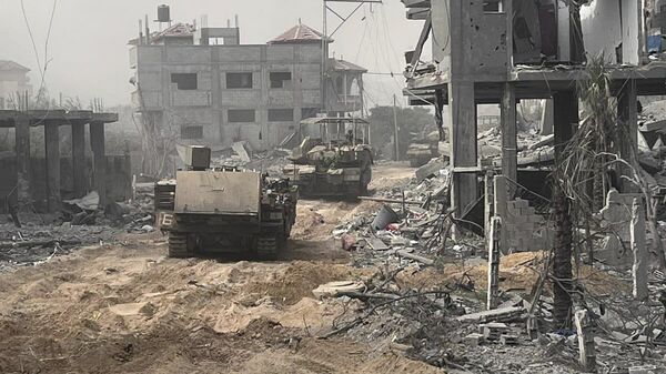 Израильские военные во наземной операции в секторе Газа - Sputnik Ўзбекистон