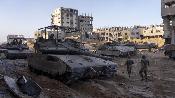 Военнослужащие израильской армии во время наземной операции в секторе Газа. Архивное фото - Sputnik Ўзбекистон