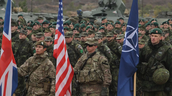 Военнослужащие во время совместных учений НАТО Iron Sword в Литве.  - Sputnik Ўзбекистон