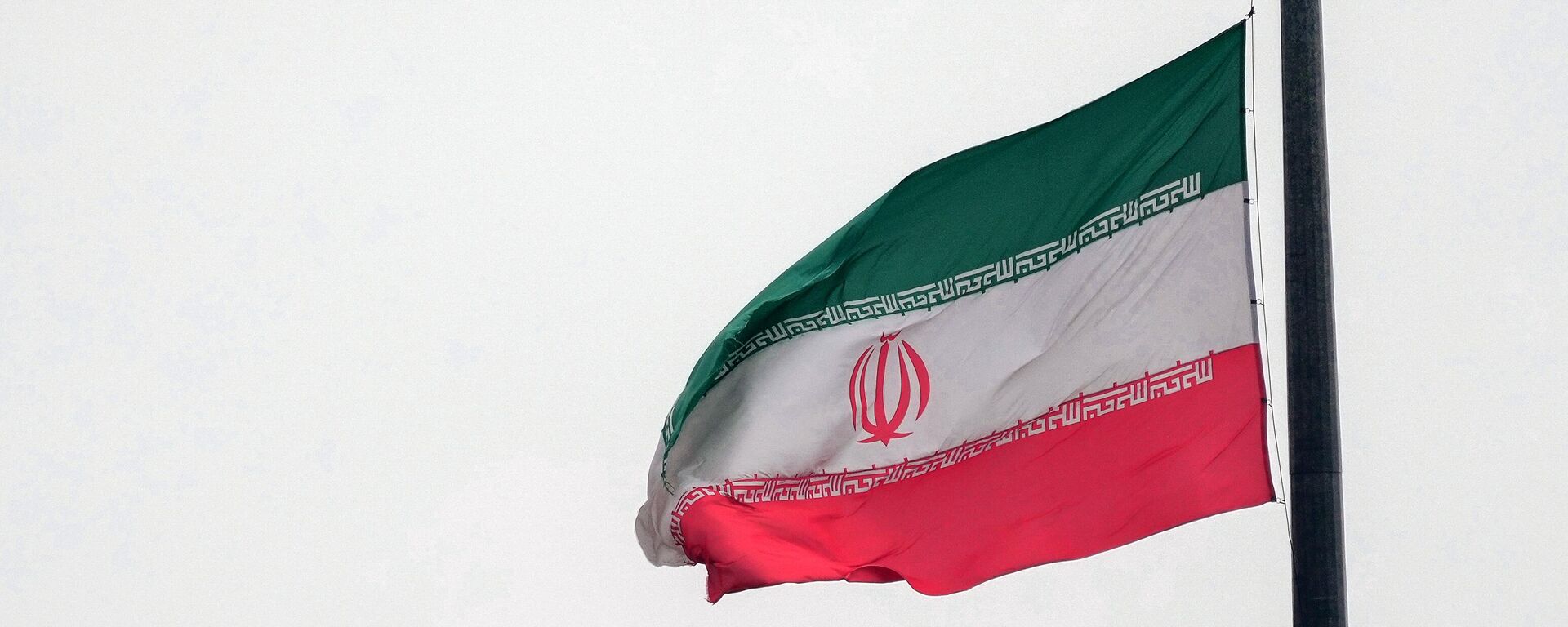 Государственный флаг Ирана в Тегеране. - Sputnik Ўзбекистон, 1920, 14.04.2024
