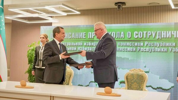 Подписан протокол о сотрудничестве между избирательными органами - Sputnik Узбекистан