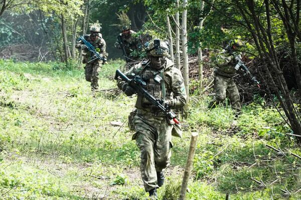 Команда Минобороны Узбекистана стала победителем международных соревнований в Южной Корее. - Sputnik Узбекистан