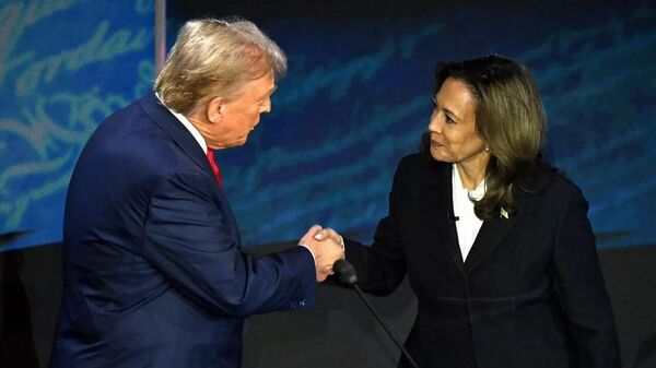 Kamala Xarris i Donald Tramp - Sputnik O‘zbekiston