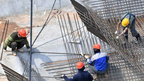 Строительство колеса обозрения Солнце Москвы Строительство колеса обозрения Солнце Москвы - Sputnik Узбекистан