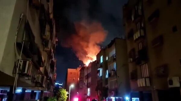В доме в центральной части Израиля после обстрела со стороны Ирана произошел пожар - Sputnik Узбекистан