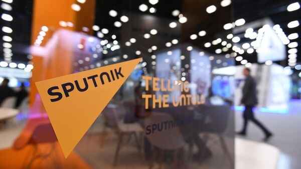 Лого международного информационного агентства и радио Sputnik  - Sputnik Ўзбекистон