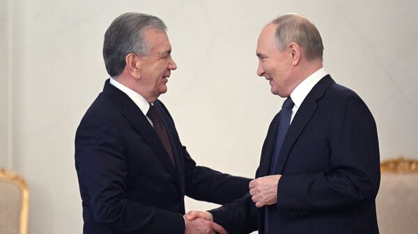 Президент РФ Владимир Путин и президент Узбекистана Шавкат Мирзиеев  - Sputnik Узбекистан
