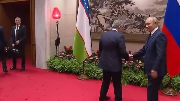 Шавкат Мирзиёев начал переговоры с Владимиром Путиным в Китае - Sputnik Узбекистан