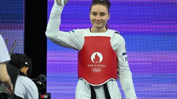 Таэквондистка из Узбекистана Светлана Осипова завоевала серебряную медаль на чемпионате мира в Китае - Sputnik Узбекистан