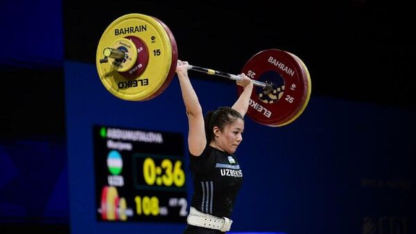 ‍ Бахрейн-2025: Еще 2 золотые медали сборной Узбекистана принесла тяжелоатлетка Маржона Абдумуталова - Sputnik Узбекистан