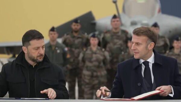 Макрон и Зеленский подписали соглашение по укреплению обороны Украины - Sputnik Узбекистан