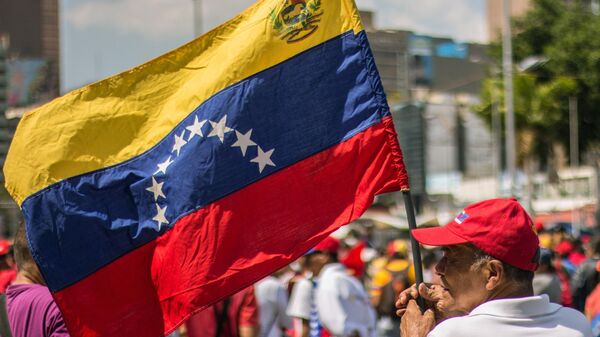 Акция в поддержку президента Венесуэлы Н. Мадуро - Sputnik Узбекистан