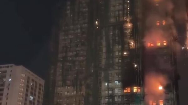 В Гонконге число погибших при пожаре возросло до 13, пострадали 22 человека - Sputnik Узбекистан
