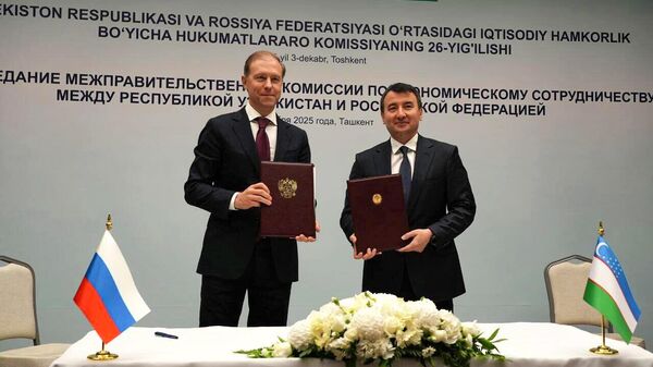 Ходжаев и Мантуров подписали дорожную карту по укреплению межрегионального сотрудничества - Sputnik Ўзбекистон