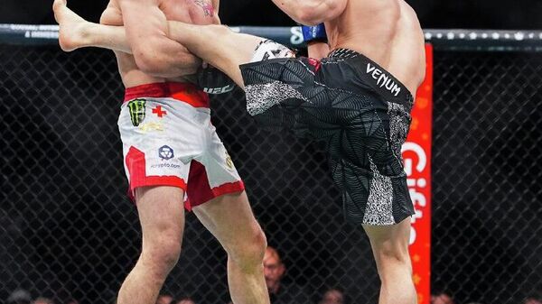 Россиянин Пётр Ян стал чемпионом UFC в легчайшем весе - Sputnik Узбекистан