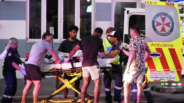 Число погибших при стрельбе на пляже в Сиднее выросло до 12 - Sputnik Узбекистан