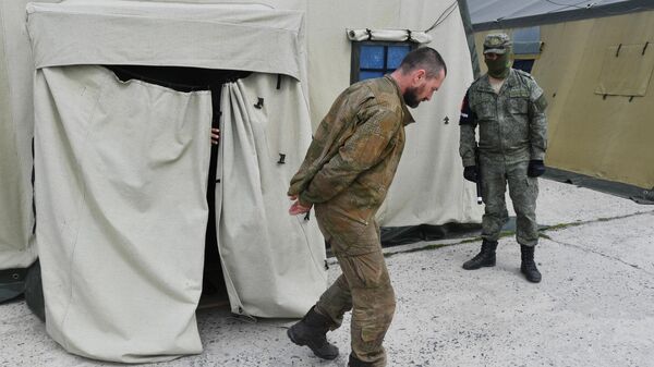 Пункт временного содержания украинских военнопленных  - Sputnik Ўзбекистон