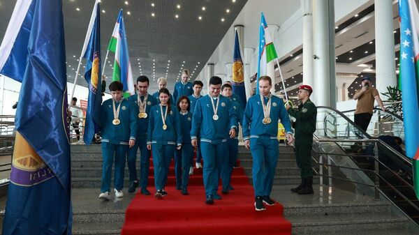 Члены сборной Узбекистана по стрельбе, принимавшие участие на ЧА в Индии, вернулись на родину.  - Sputnik Узбекистан